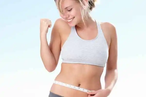 woman happy after fat reduction treatment Bricket Wood